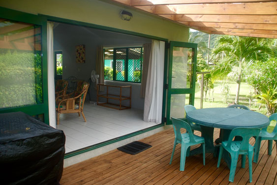Sliding doors from the lounge lead to the wooden deck