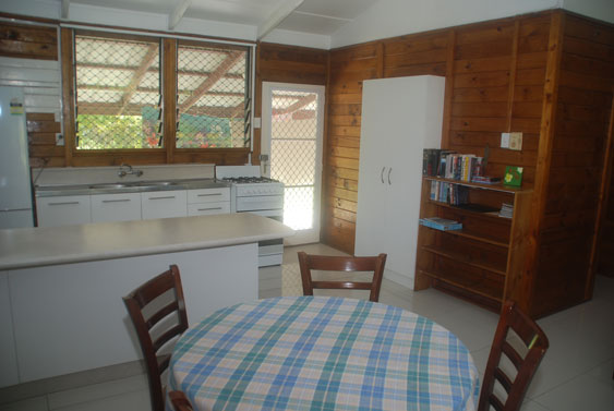 indoor dining and kitchen at Macs Shack, Titikaveka