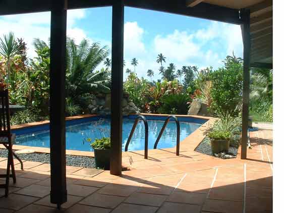 view of the pool from the veranda at Muri Lodge, Rarotonga, Cook Islands