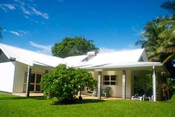 exterior of Are Meika, from the backyard looking thru the banana trees to the veranda