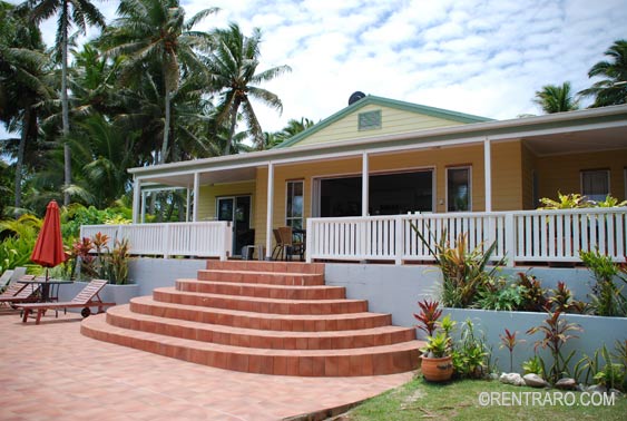 steps lead from the pool up to this purpose built three bedroomed home