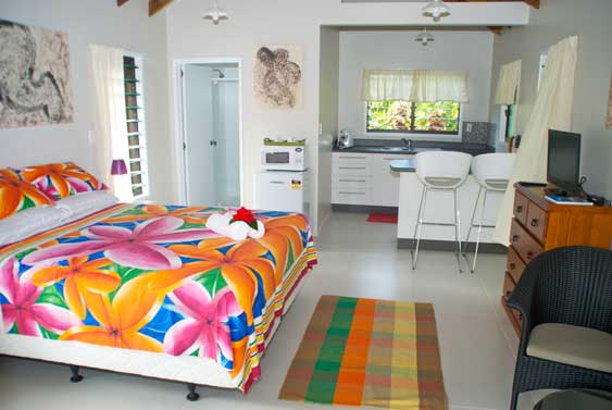 From the covered verandah, the bungalow opens up to spacious bedroom and living area