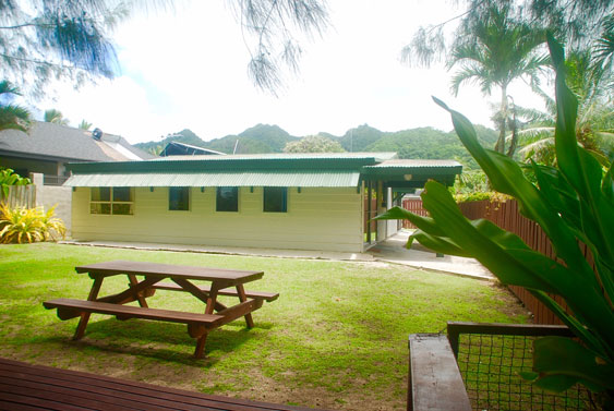 theres a BBQ table at the end of the yard overlooking the beach and lagoon