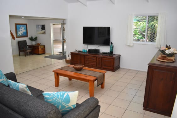 the living room from another angle with large TV